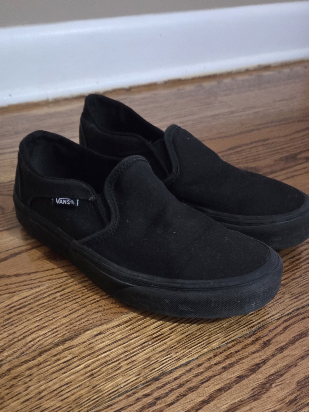 Vans Women's Black Canvas Slip-On Sneakers